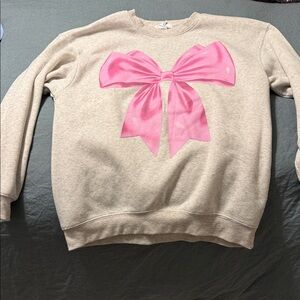 Elegant Beige Sweater with Pink Bow